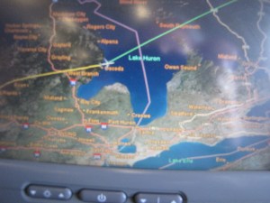 Picture of the map on the plane as we moved out of Michigan over Lake Huron and into Canada